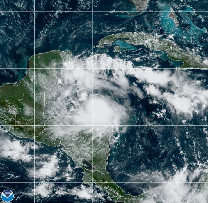This satellite image released by the National Oceanic and Atmospheric Administration (NOAA) shows Tr