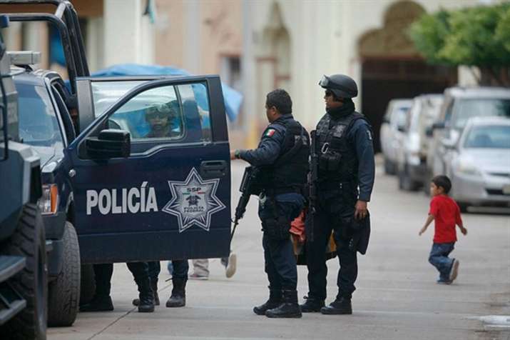 11 people killed as armed assailants open fire at Mexico bar