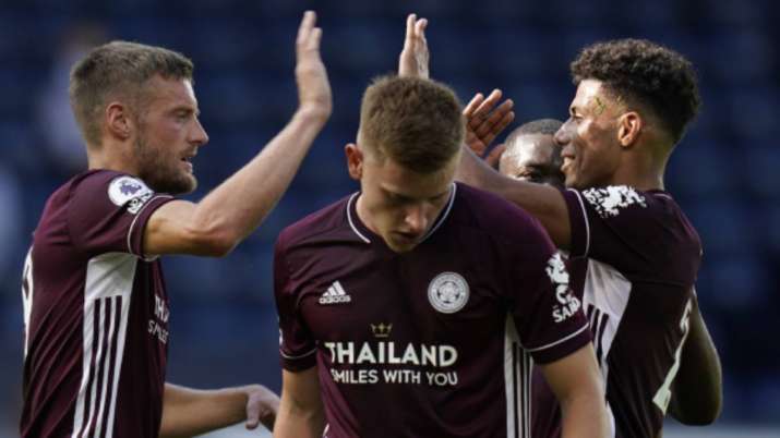 Leicester's Jamie Vardy, left, celebrates with teammates