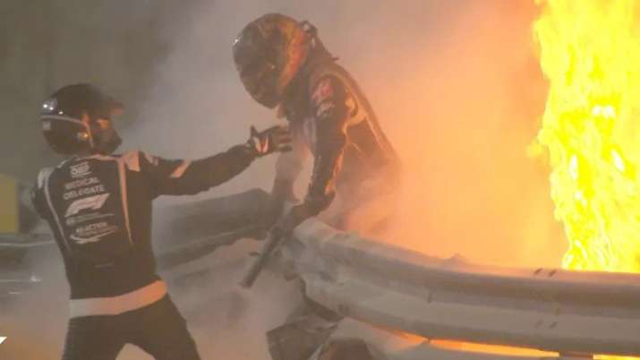 Grosjean was helped out of the car and into an ambulance.