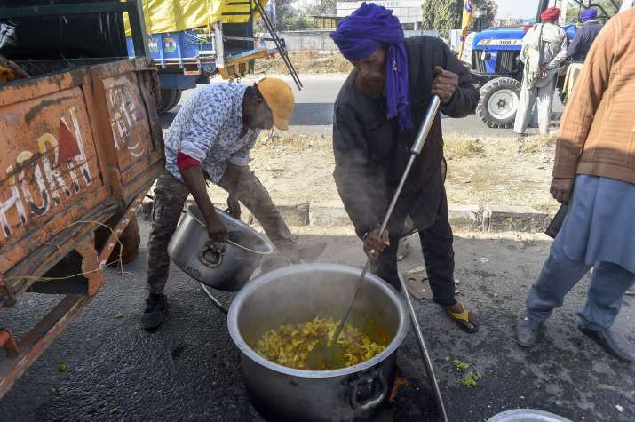 India Tv - New Delhi: Farmers protest at Singhu border during their Delhi Chalo march against the Centres new farm laws, in New Delhi, Sunday, Nov. 29, 2020. 