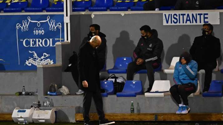 Real Madrid's head coach Zinedine Zidane reacts during a