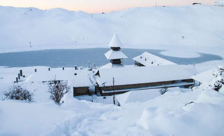 India Tv - Mandi: Prashar Lake covered with snow after heavy snowfall in Mandi district of Himachal Pradesh, Monday, Dec. 28, 2020. The lake is located at a height of 2730m above sea level.