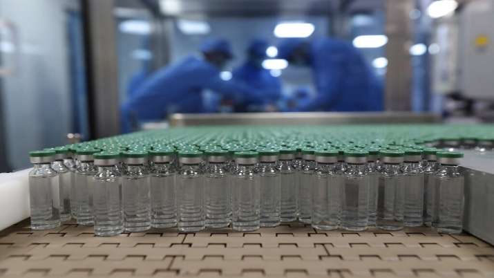 Vials of COVID-19 vaccine are seen before they are packed