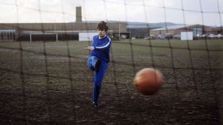Leeds United's Peter Lorimer practices in Leeds, England
