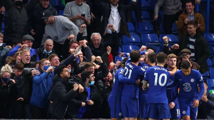 India Tv - Chelsea fans celebrate with the team during the Premier League match between Chelsea and Leicester City at Stamford Bridge on May 18