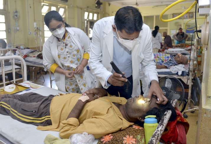 Doctors treat a Black Fungus infected patient at