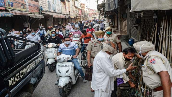 Police force shopkeepers to close shops during the start of