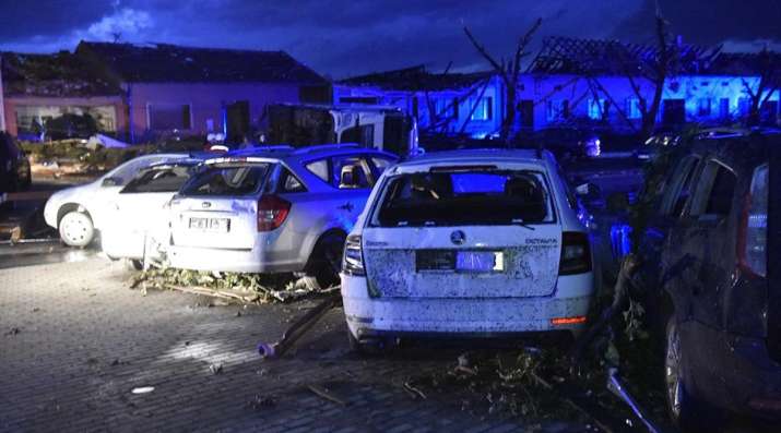 Cars and houses have been damaged by the tornado in the village