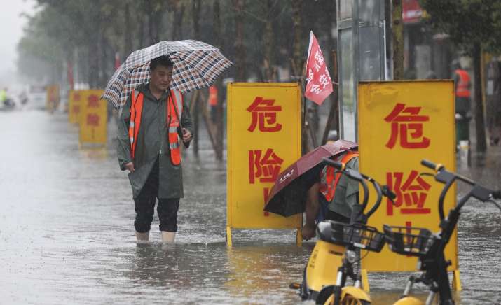 india tv - china floods, china floods latest news, china floods dam photos, china floods videos latest news, f