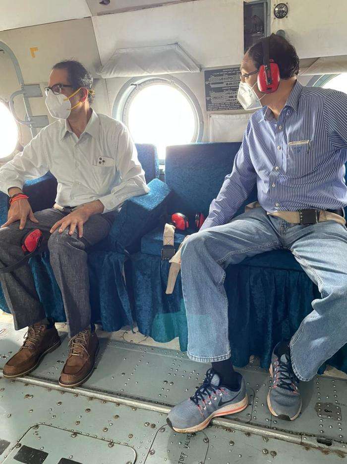 India Tv - CM Uddhav Thackeray, chief secretary Sitaram Kunte in a helicopter en route to Mahad landslide site
