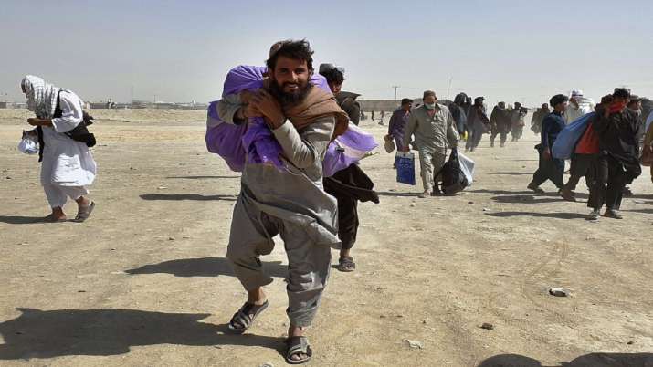 Stranded people gather and wait to open the border which