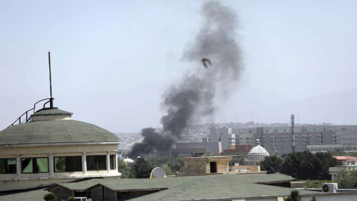 Smoke rises next to the US Embassy in Kabul, Afghanistan on
