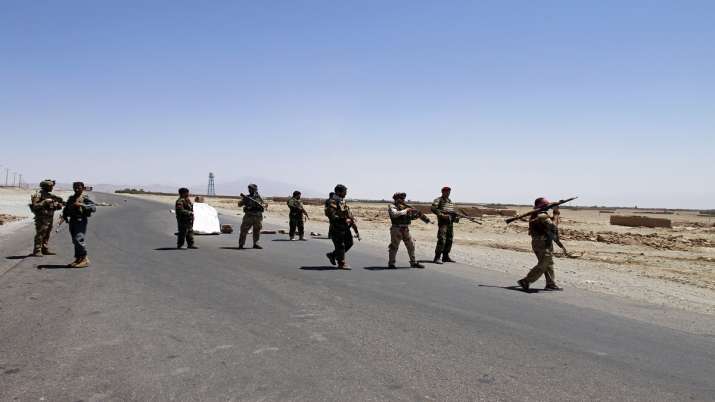 India Tv - Afghan security personnel patrol after they took back control of parts of the city of Herat following fighting between Taliban and Afghan security forces on the outskirts of Herat, 640 km (397 miles) west of Kabul, Afghanistan.