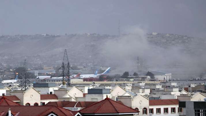 Smoke rises from explosion outside the airport in Kabul,