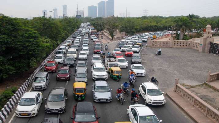 Vehicles on a busy Noida road.