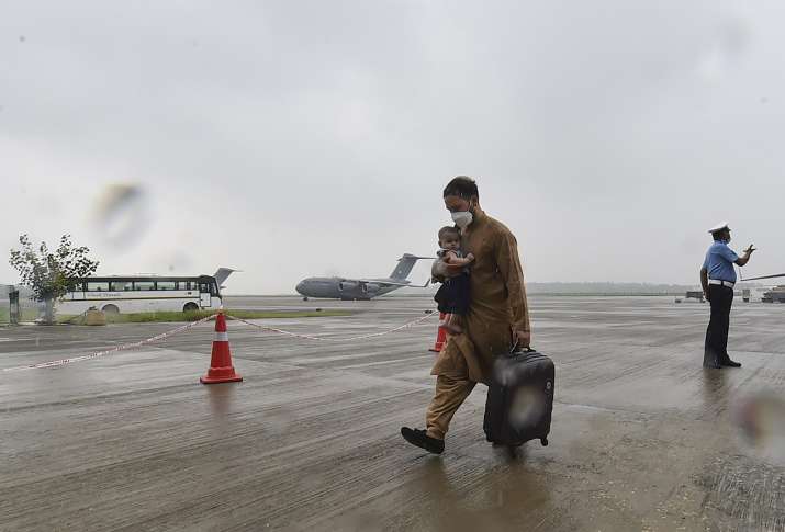 evacuated afghans brought to india from doha