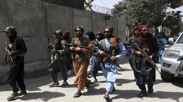 Taliban fighters patrol in Wazir Akbar Khan neighborhood in