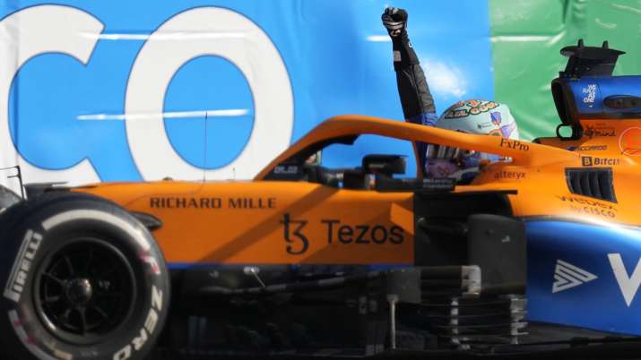 Mclaren driver Daniel Ricciardo of Australia celebrates