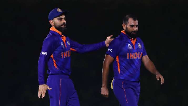 Indian captain Virat and Shami in the warm-up game against England in the T20 World Cup 2021 | SportzPoint.com