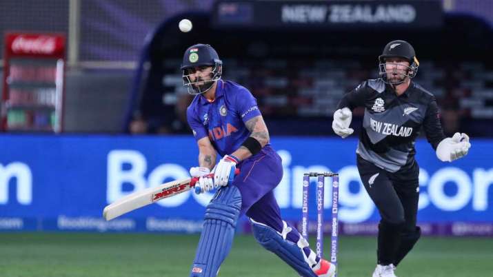 India Tv - India's captain Virat Kohli plays a shot during the Cricket Twenty20 World Cup match between New Zea