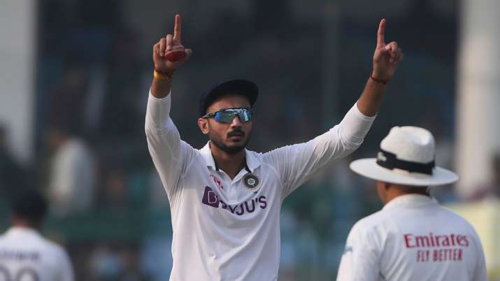 India's Axar Patel gestures to a teammate during the day three of their first test cricket match wit
