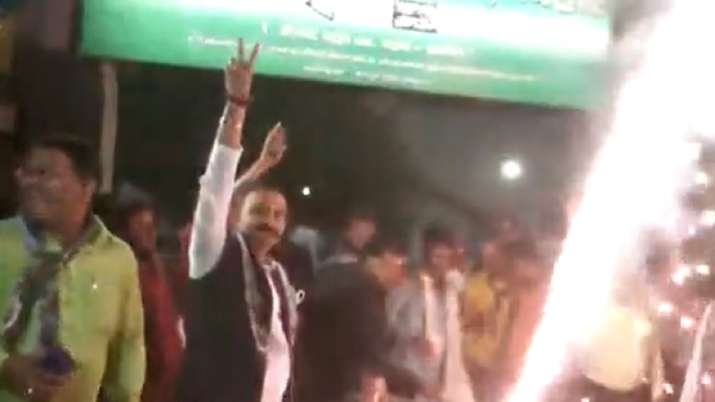 JD(U) celebrates after winning by-poll election at two