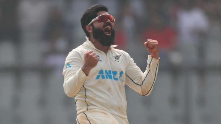 New Zealand's Ajaz Patel celebrates the dismissal of India's Mohammed Siraj during the day two of th