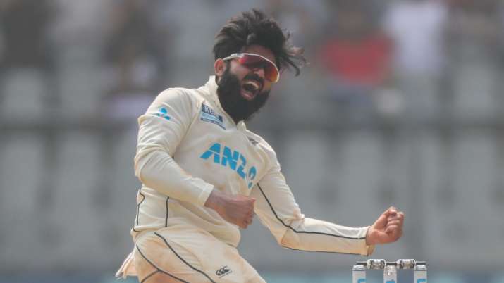 New Zealand's Ajaz Patel celebrates the dismissal of India's Mohammed Siraj during the Day 2 of the 
