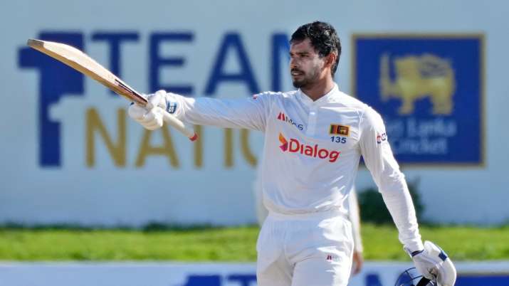 Sri Lankan batsman Dhananjaya de Silva celebrates after scoring a century against West Indies on Day