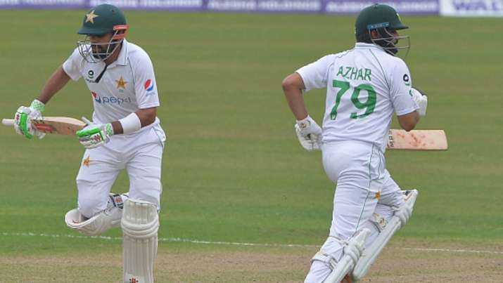 Pakistan's Babar Azam (left) run between the wickets with