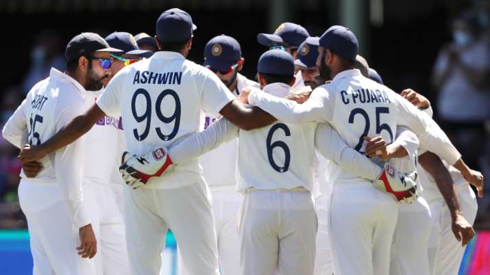 The Indian team form a huddle as they prepare to take the field during a Test match in Australia.