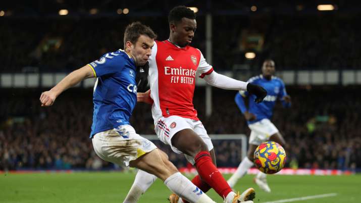 Seamus Coleman of Everton clears the ball whilst under pressure from Eddie Nketiah of Arsenal during
