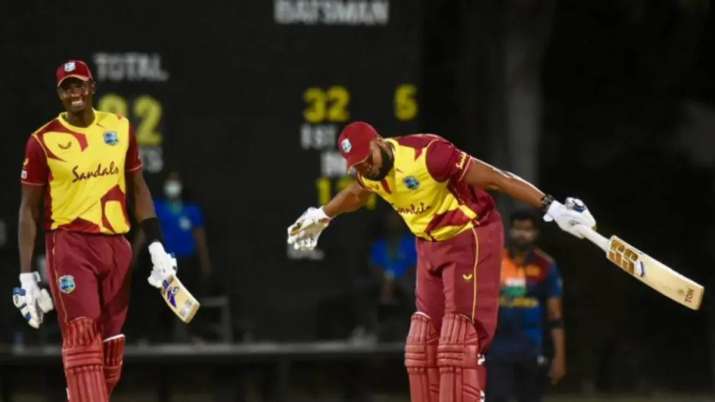 India Tv - West Indies captain Kieron Pollard celebrates after hitting six sixes in an over. 