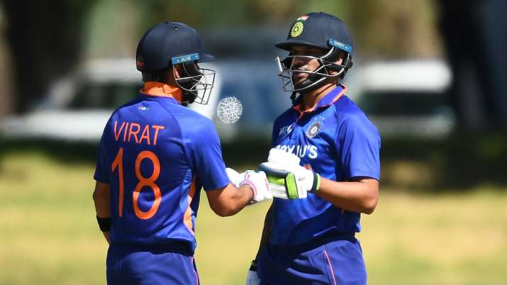 Shikhar Dhawan and Virat Kohli give a fist bump to boost morale as they chase the target 
