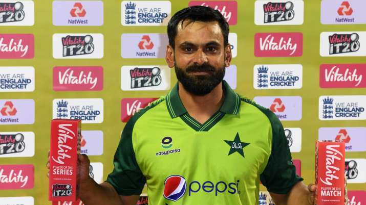 Pakistan's Mohammad Hafeez posing with Vitality Player of the Match and Player of the Series. 