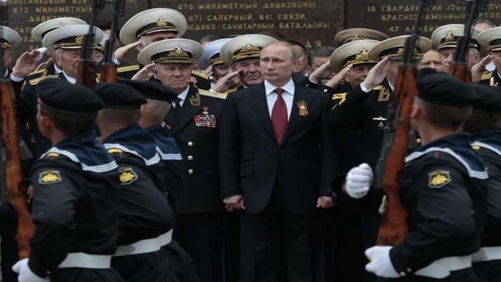 Russian President Vladimir Putin attends a parade marking