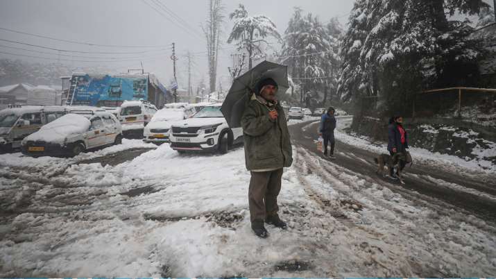 Jammu: A man standing in the snow covered area of ​​Jammu and Kashmir