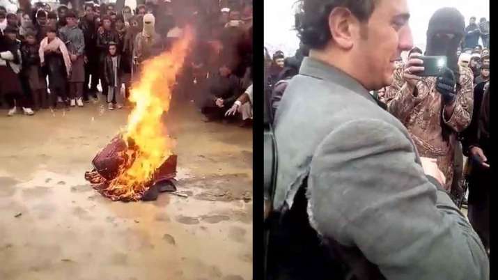 Taliban men laugh and burn instrument in front of weeping musician | Watch