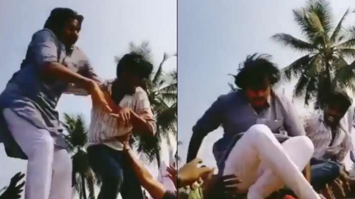 Pawan Kalyan slips and falls from car's roof after fan tries to hug him.  Watch viral video