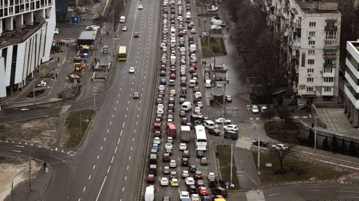 Traffic jams are seen as people leave the city of Kyiv