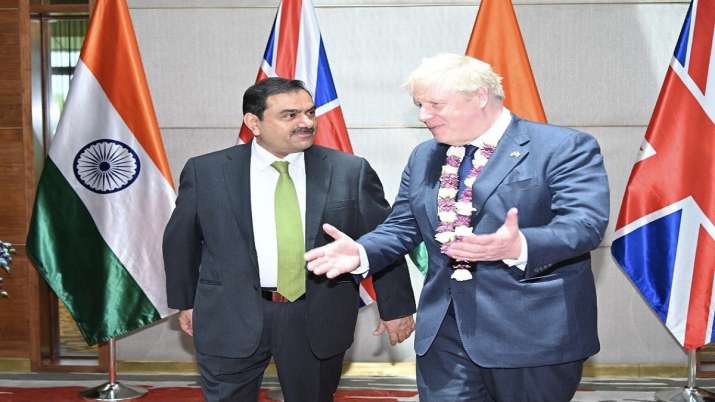 Business tycoon Gautam Adani, UK PM Boris Johnson talk defense at Adani headquarters