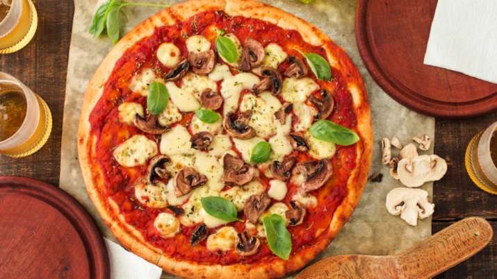 Don’t throw away mushrooms from pizza, they can counteract health risks linked to Western-style diet