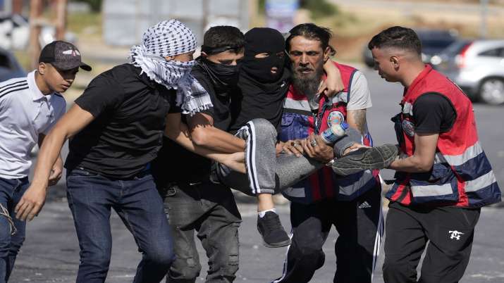 Palestinians say teen killed by Israeli fire in West Bank