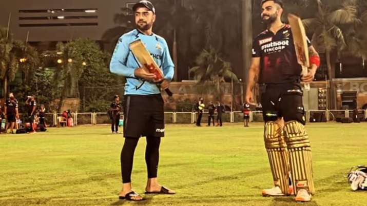 IPL 2022 Virat Kohli imitates Rashid Khan's batting style in hilarious video ahead of RCB vs GT at the Wankhede stadium | Cricket News – India TV