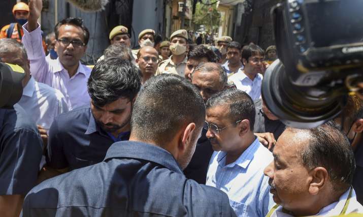 India Tv - Delhi Chief Minister Arvind Kejriwal and his deputy, Manish Sisodia, visited the spot on Saturday.  The chief minister announced a compensation of Rs 10 lakh each to the kin of the deceased and Rs 50,000 for those injured in the fire, which started from the first floor of the building.  