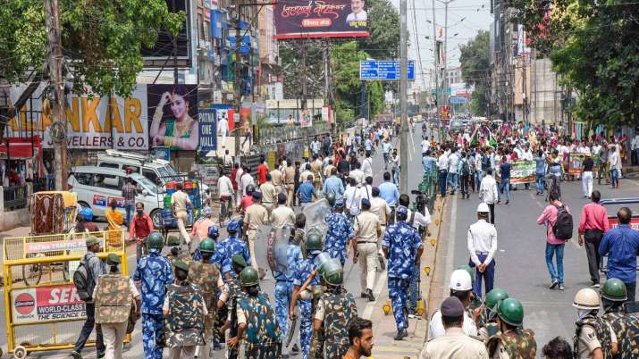 Security personnel patrol during the Bihar Bandh, called to