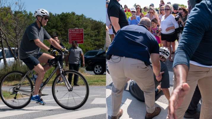 Watch: Biden falls down while getting off bike after beach ride