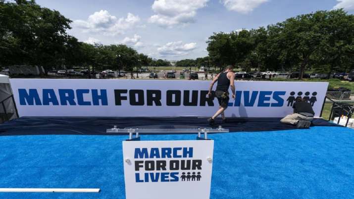 Thousands rally for gun reform after surge in mass shootings