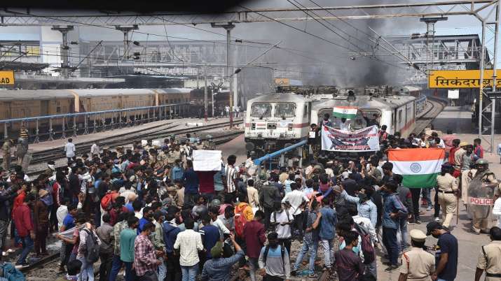 A mob vandalises trains and railway properties at the
